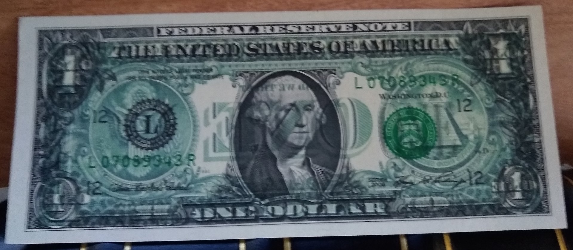 1 dollar-back on front.jpg