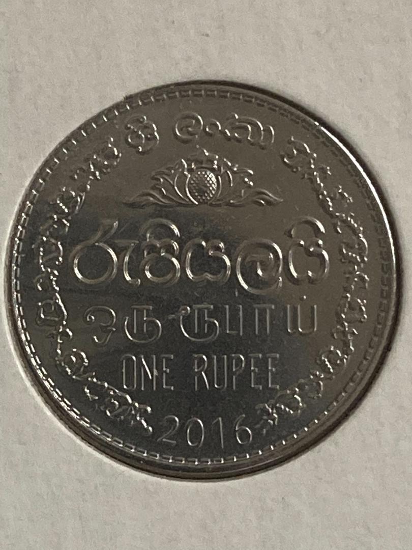 1 rupee heads.jpeg