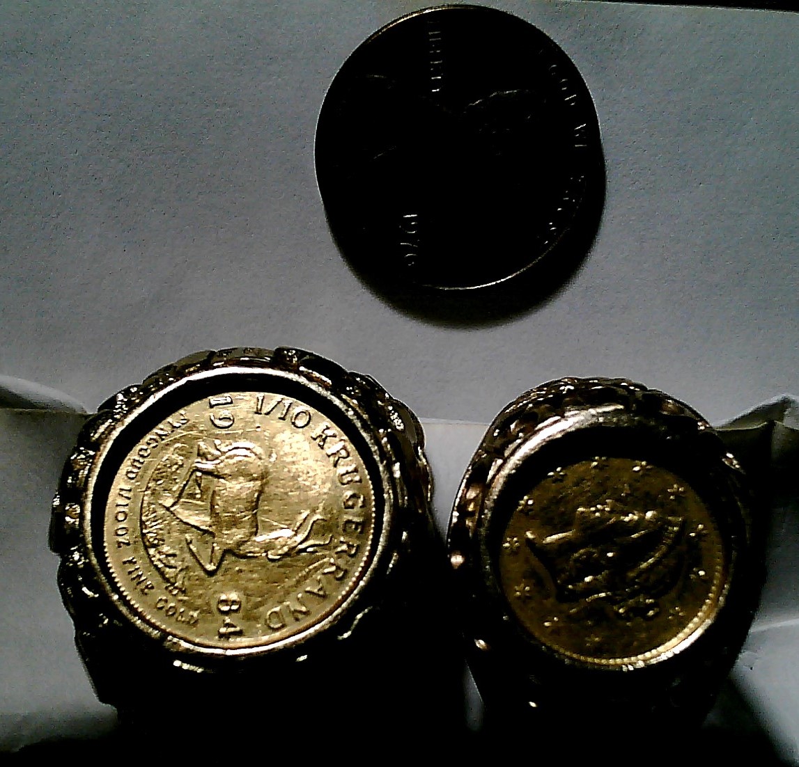 1 tenth Kugerrand and 1851 one dollar gold.jpg