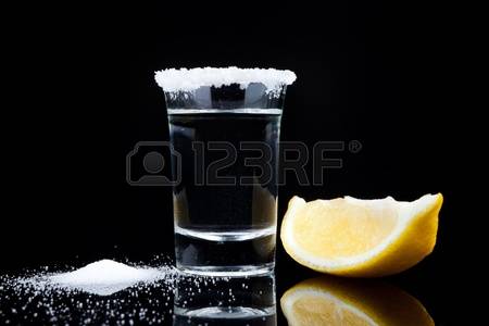 10975110-tequila-shot-with-lemon-and-salt-close-up-on-black-background.jpg