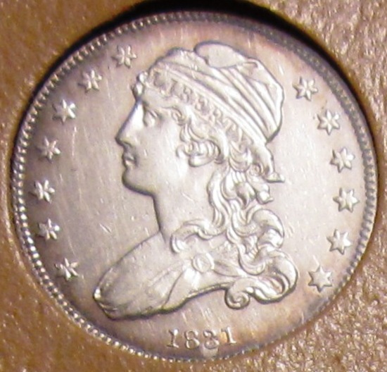 1831 Sm Bust Quarter in Dansco.jpg