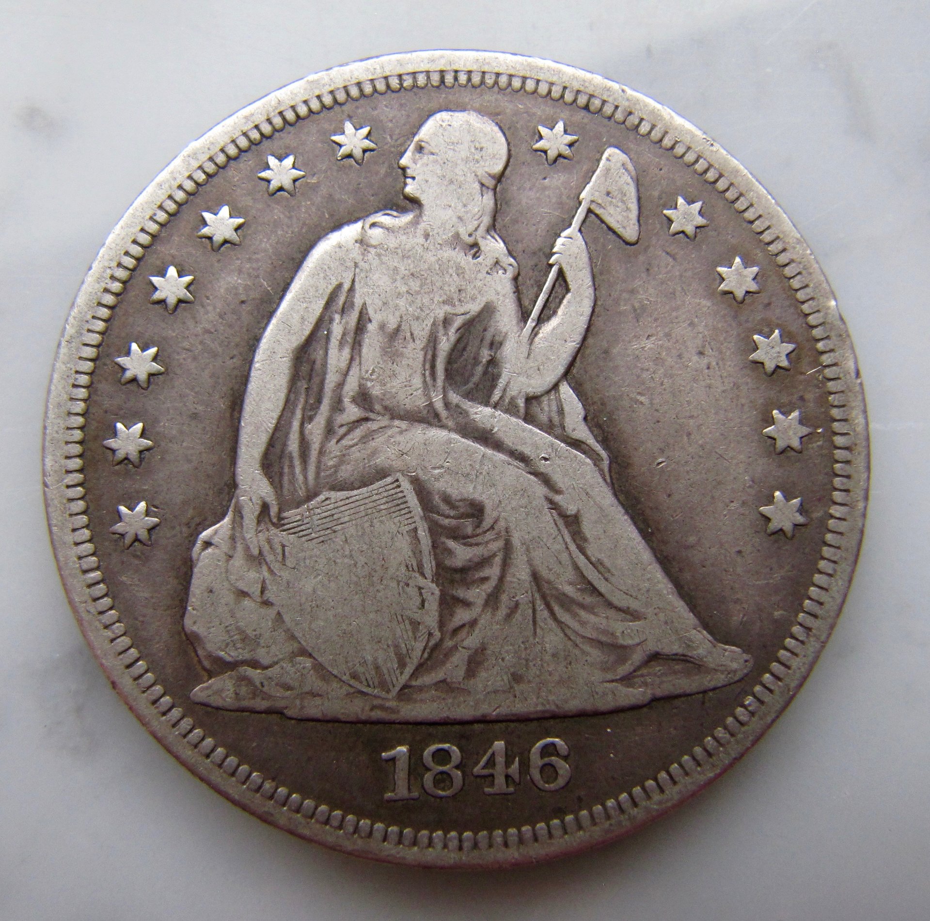 1846 Seated Dollar-Obv - 1.jpg