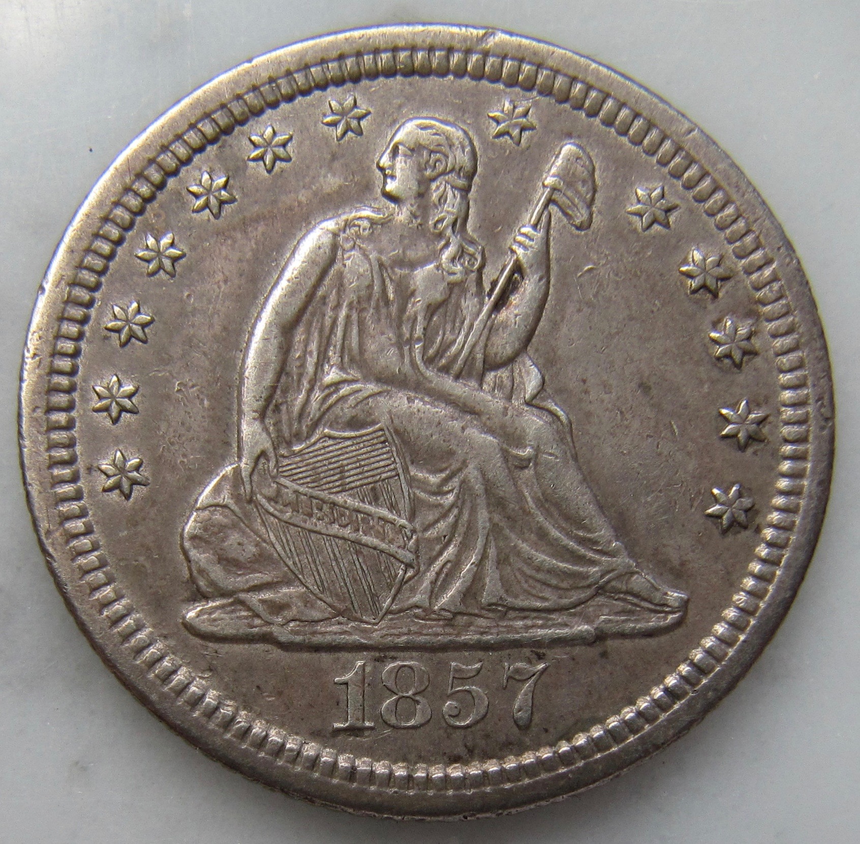 1857 - S Quarter-Obv - 1.jpg
