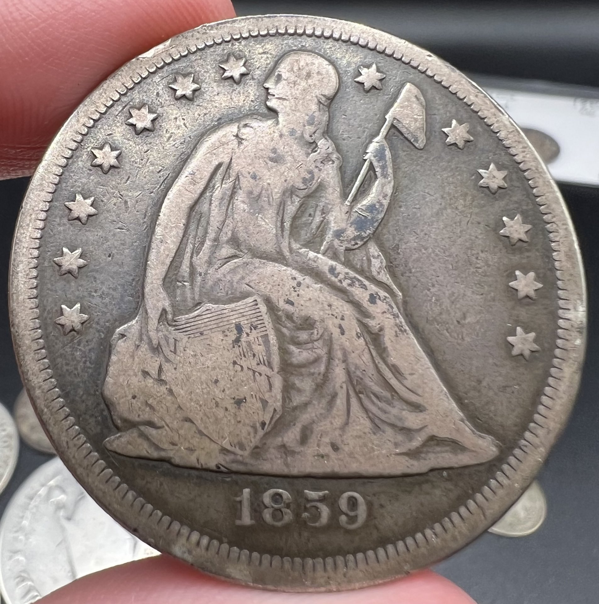 1859O Seated Dollar Obverse.jpg