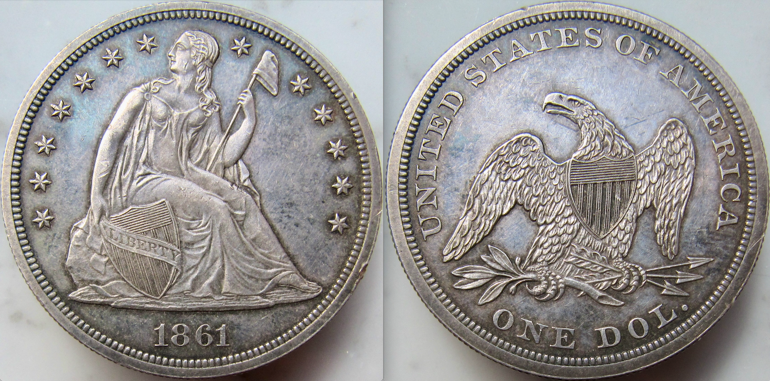 1861 Seated Dollar - OBV:REV - VGP - Natural - June 2023.png