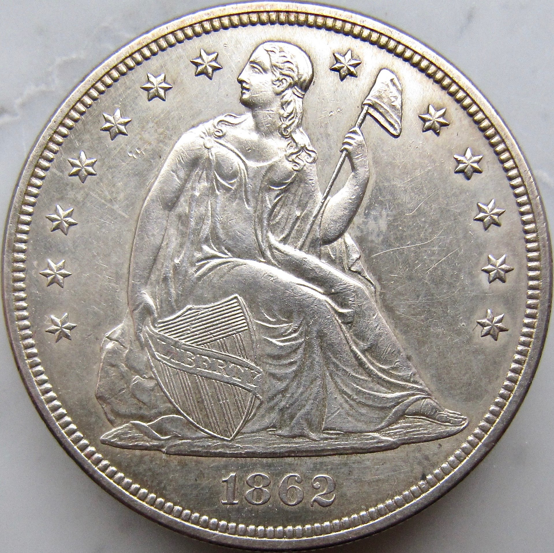 1862 Seated Dollar OBV2 N - 1.jpg