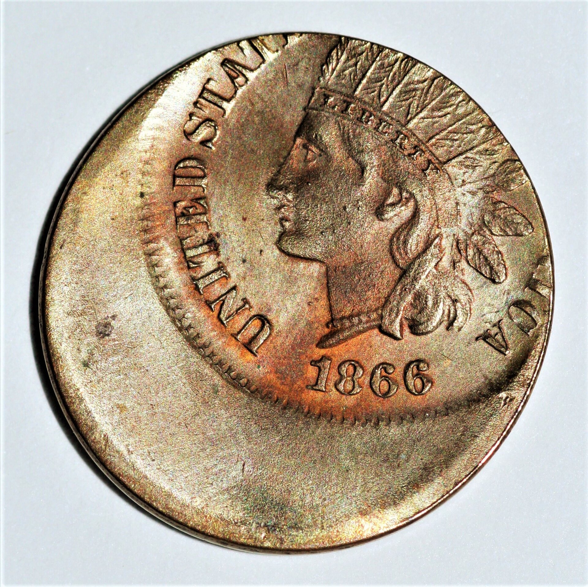 1866 1c IHC 50% OC fake obv.jpg