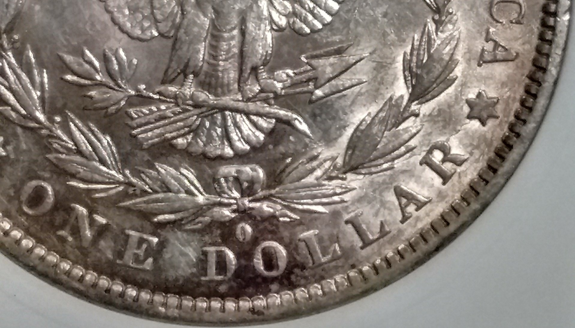 1882 O morgan crack wreath to rim.jpg