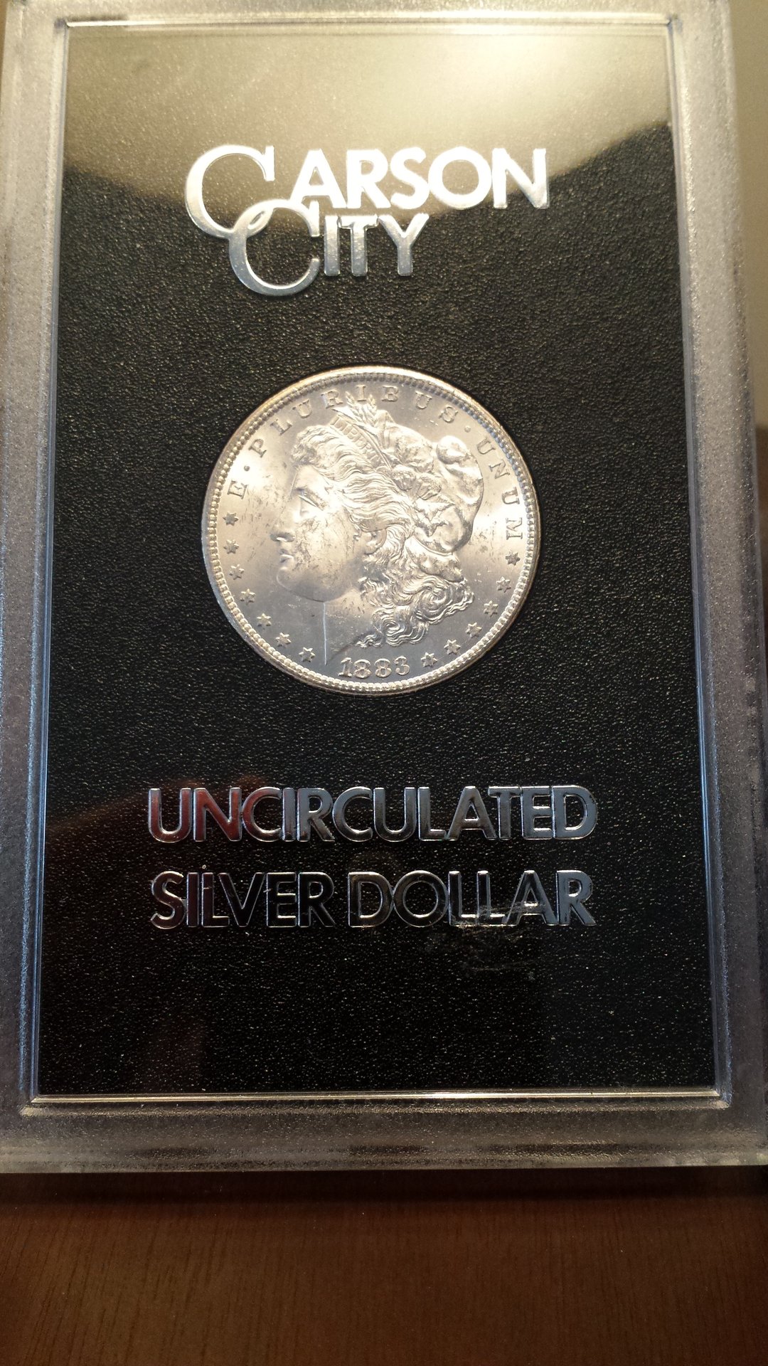 1883 CC Morgan in holder.jpg