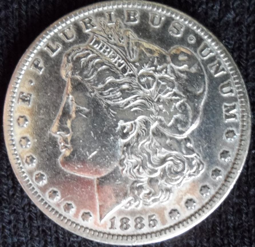 1885 Morgan Silver Dollar Obverse.JPG