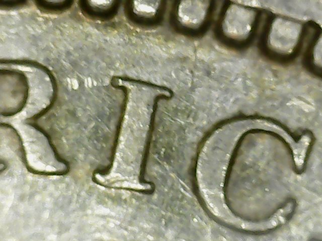1886-S a1 10 chipped I in liberty.jpg