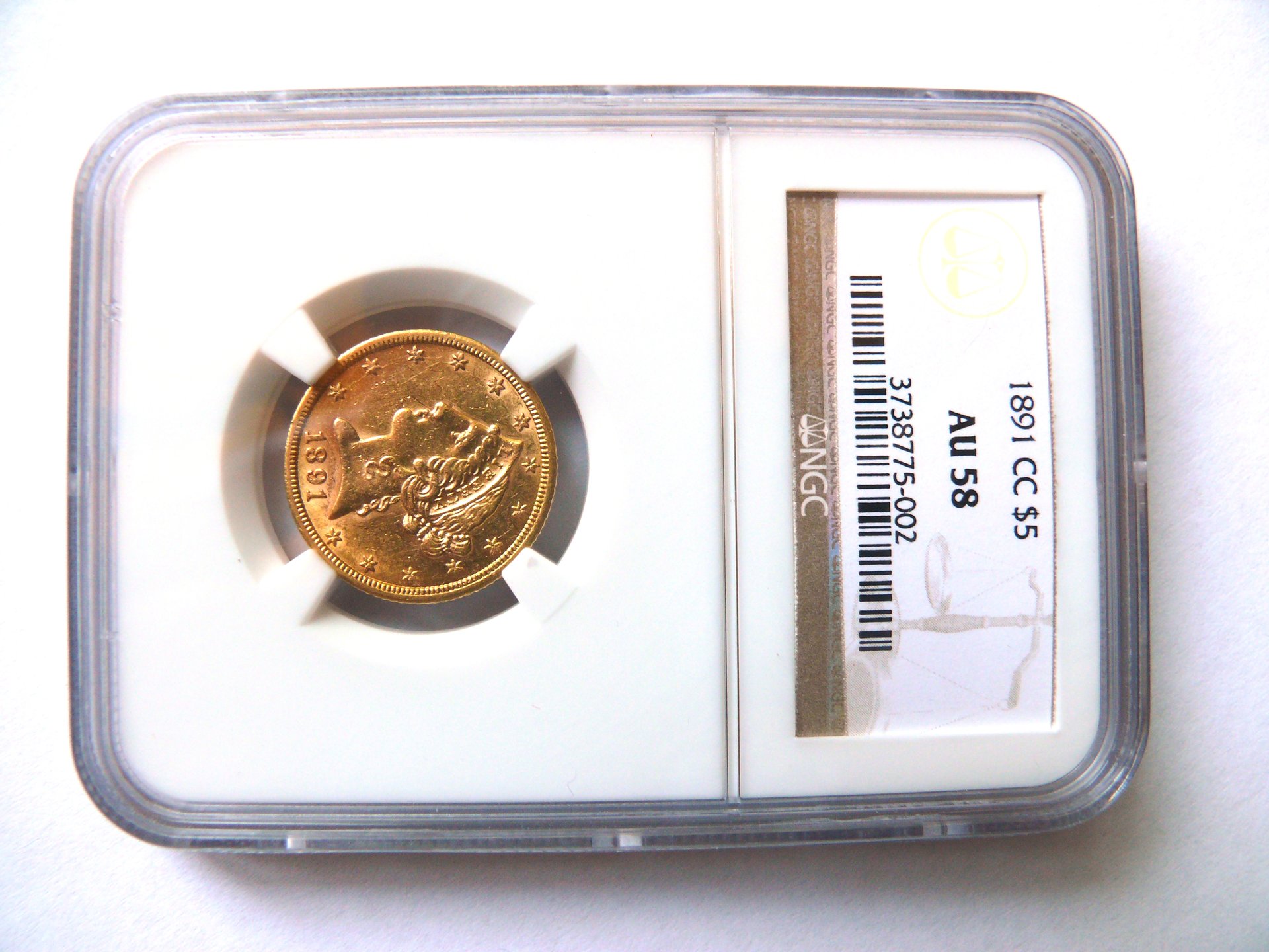 1891 CC $5 half eagle front AU58 NGC e.jpg