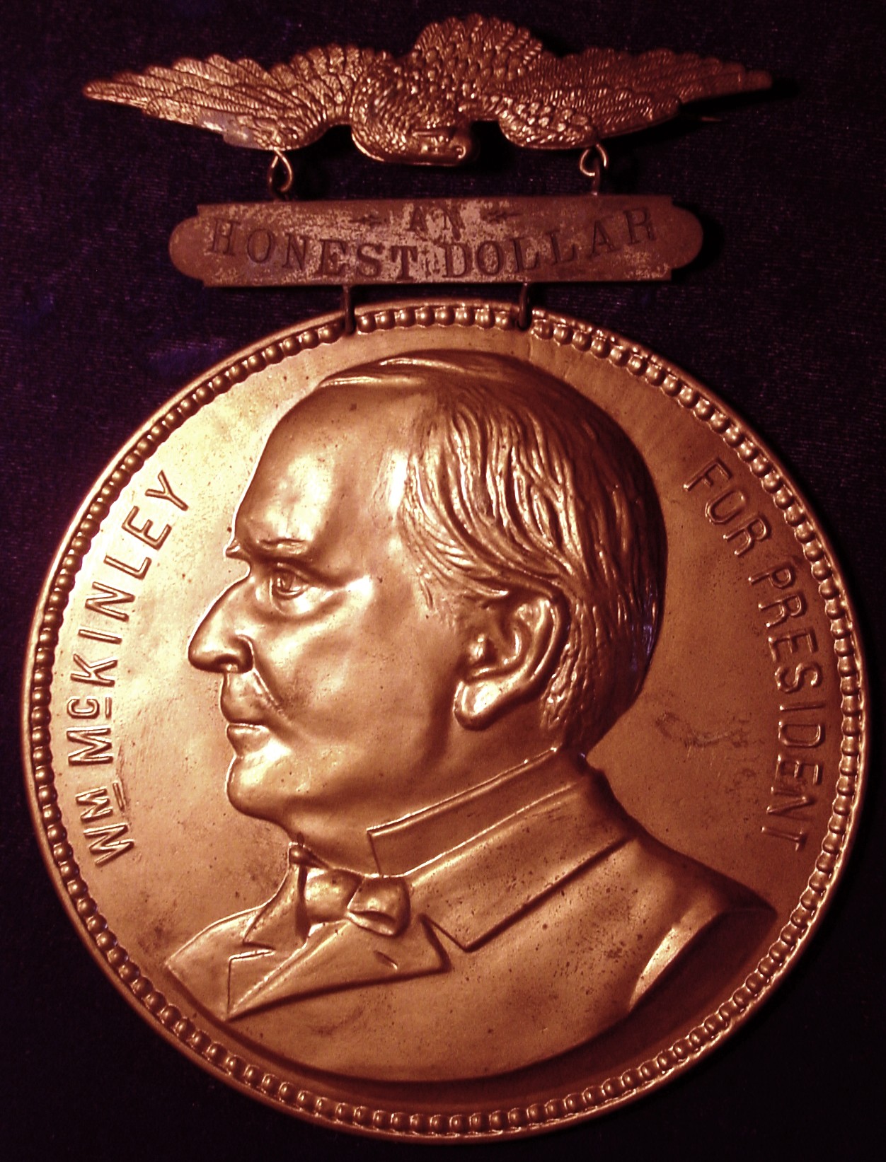 1896 Large Mckin Proc Badge O.jpg