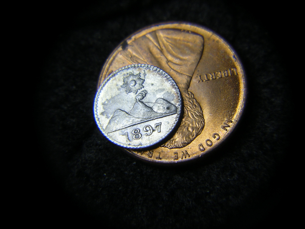1897 1-4th Real on 1 cent.jpg