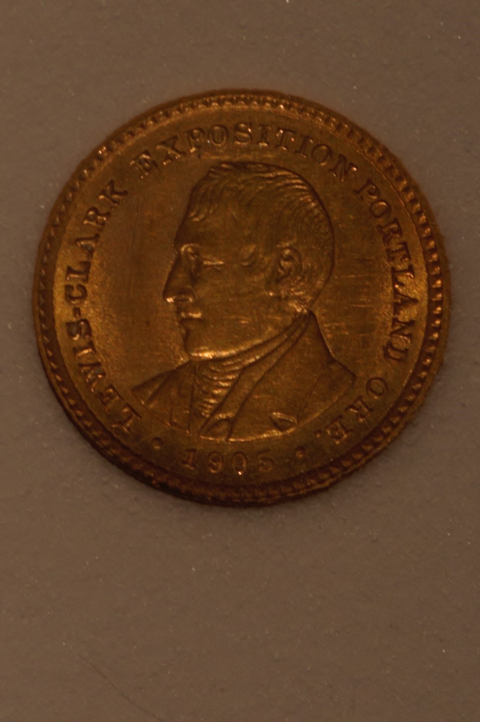 1904 Lewis and Clark Gold Dollar slab.jpg