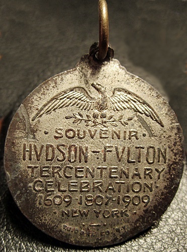1909Hudson-FultonTercentenaryWhiteMetalWithRibbonMedalREV.jpg