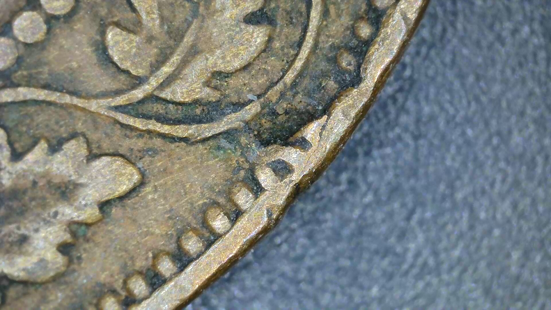 1921_canada_cent_reverse_lr_quad.jpg