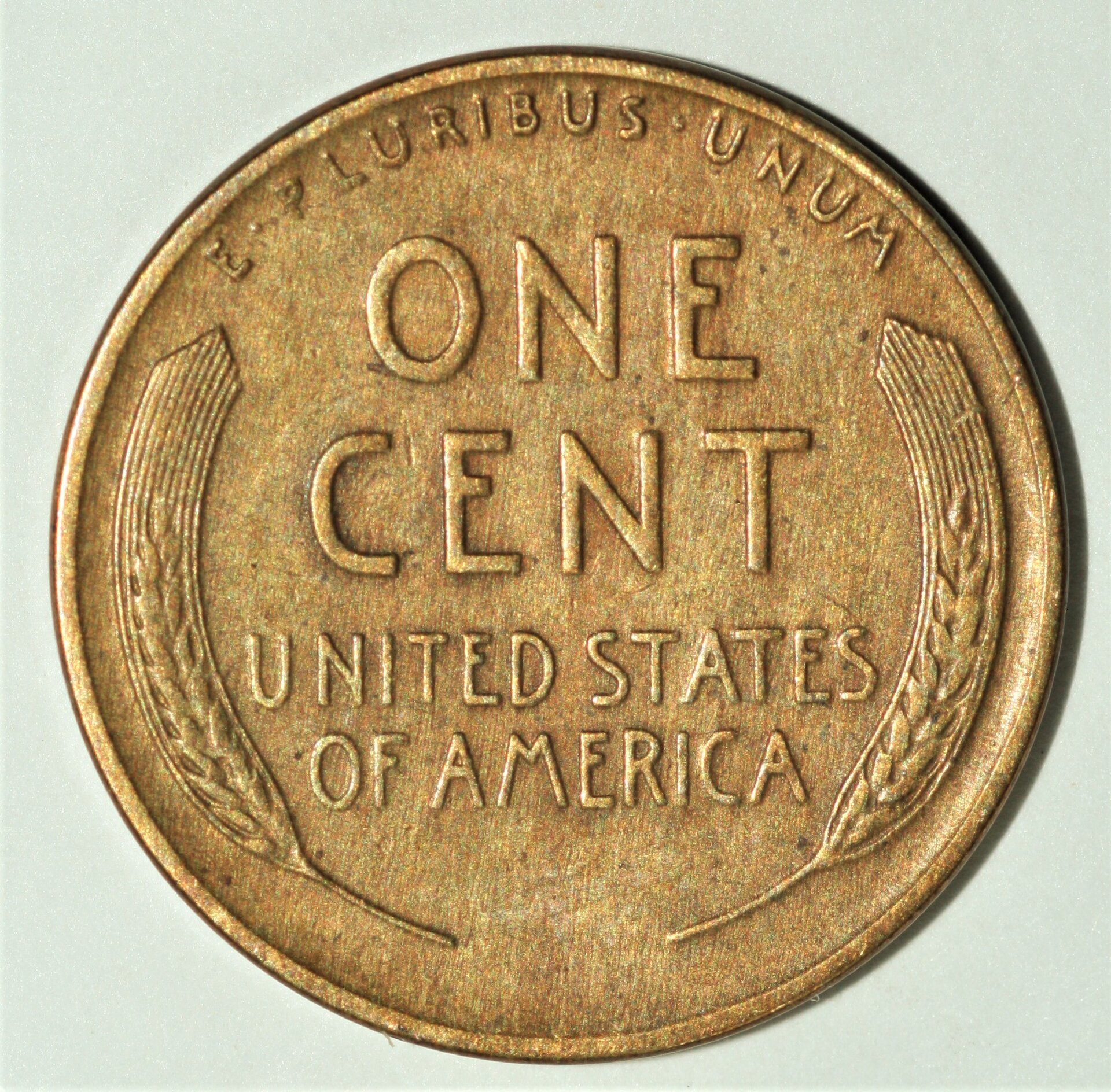 1941 1c brass rev uncert.JPG