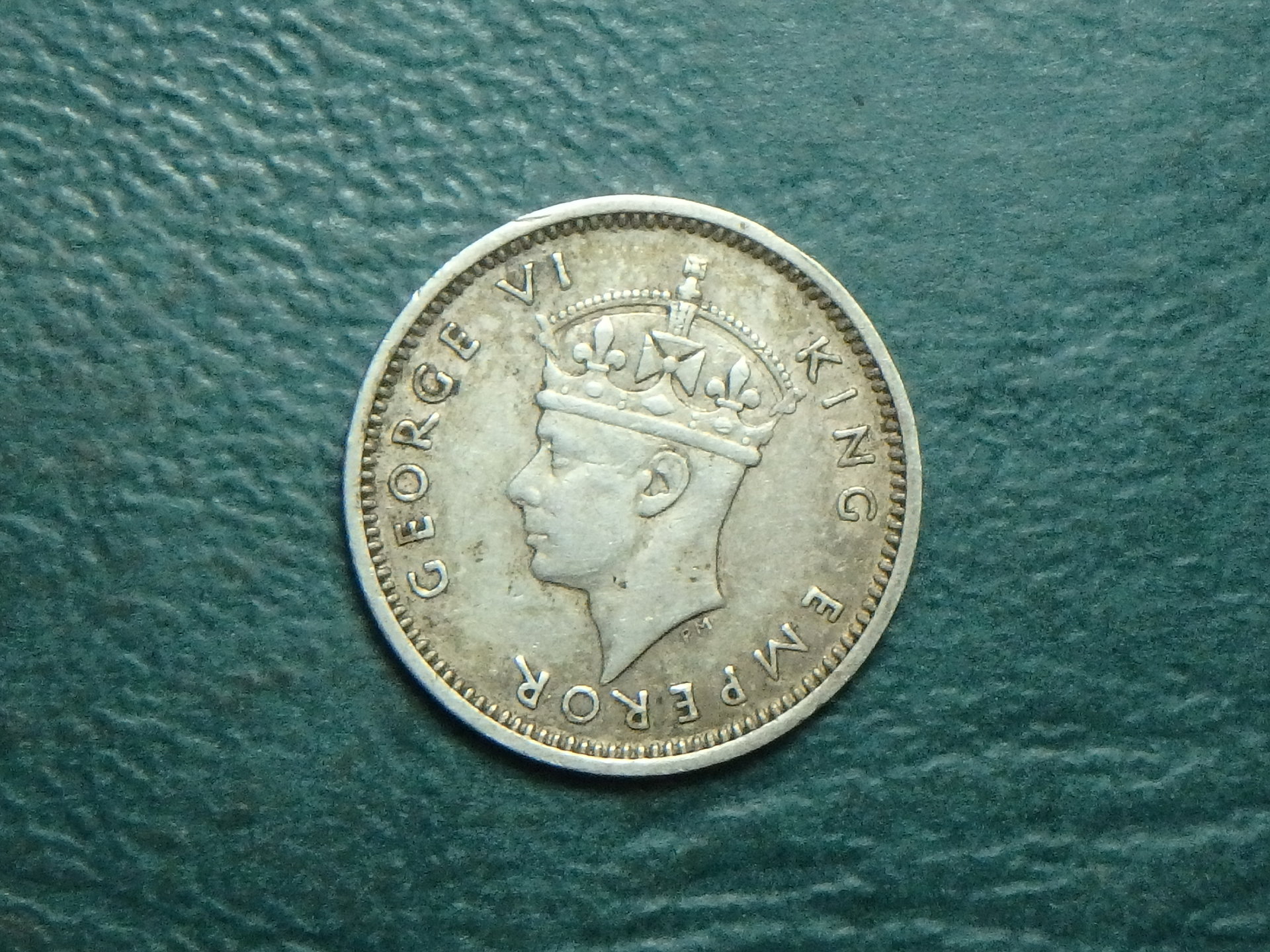 1942 S Rhodesia 3 p obv.JPG