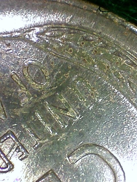 1945 toned reverse die scratch.jpg