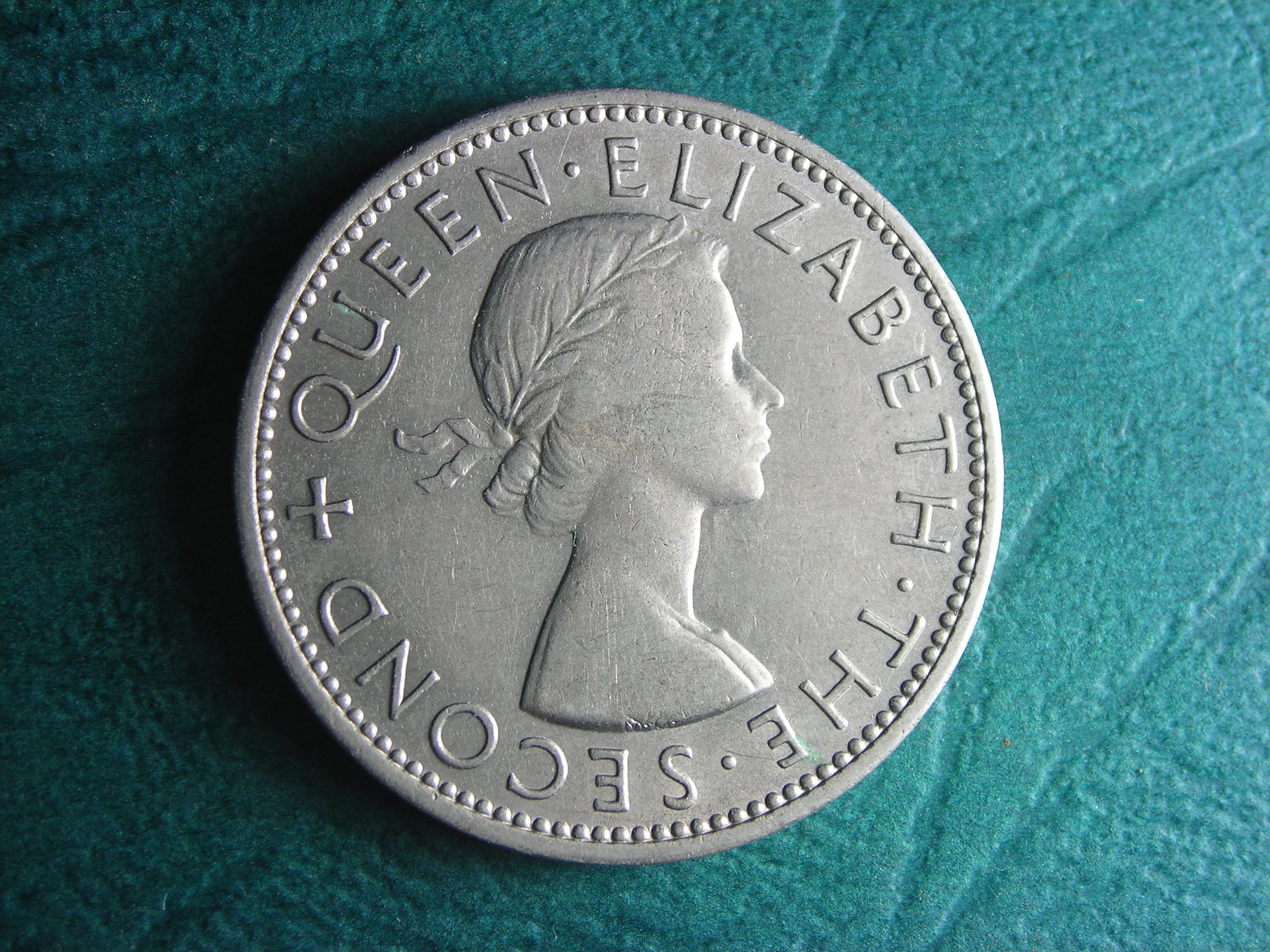 1955 Rhodesia and Nyasaland 2 shilling obv.JPG