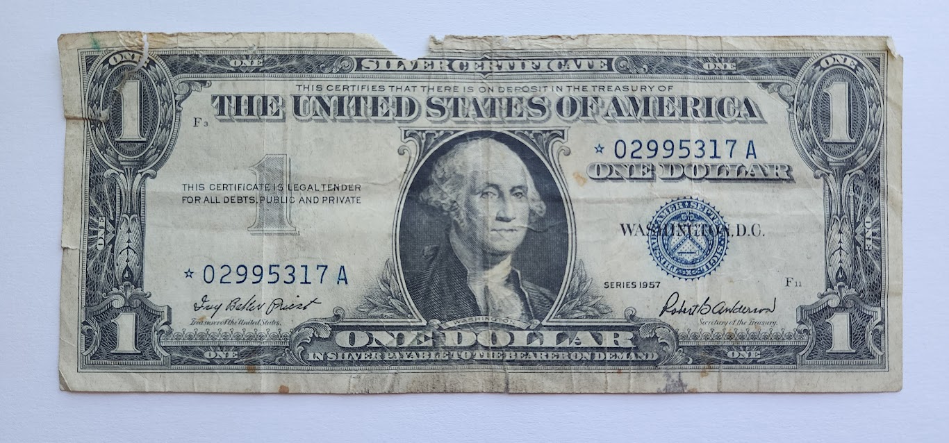 1957 $1 silver cert blue seal front.jpg