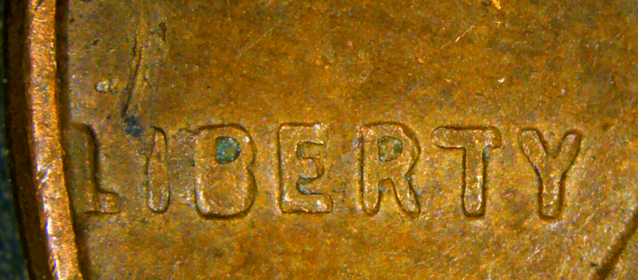 1957D_die_chips_liberty.png