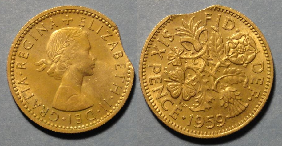 1959 sixpence clipped planchet.png