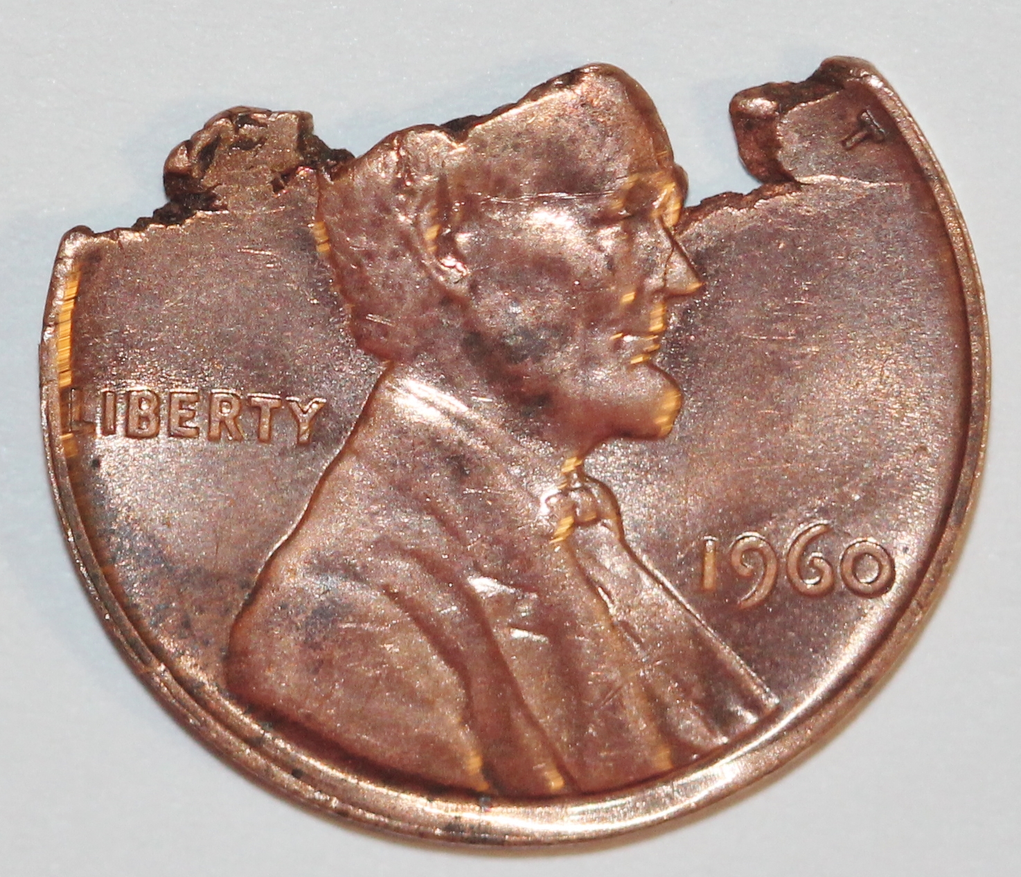1960 1c ragged clip obv.JPG