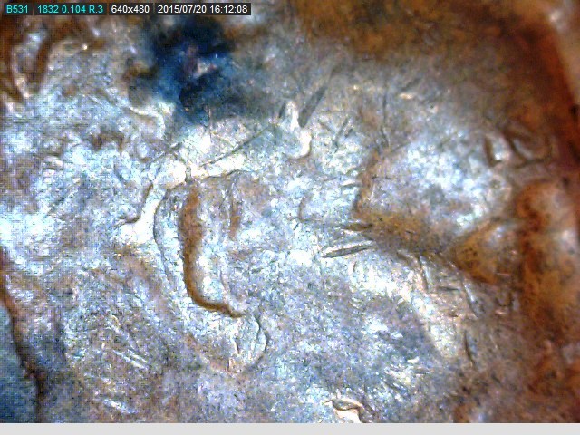 1960 D die crack over ear.jpg