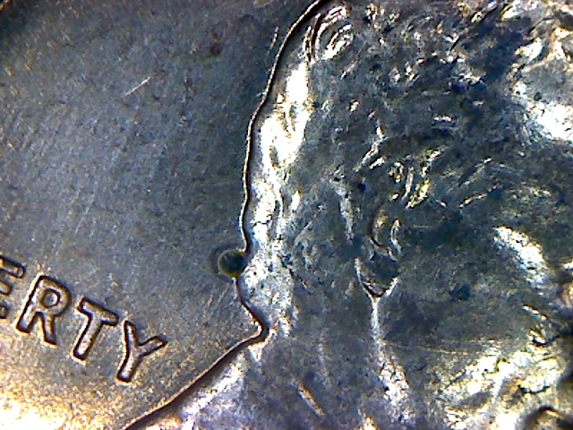 1960 D Particle Obv Detail Closer.jpg