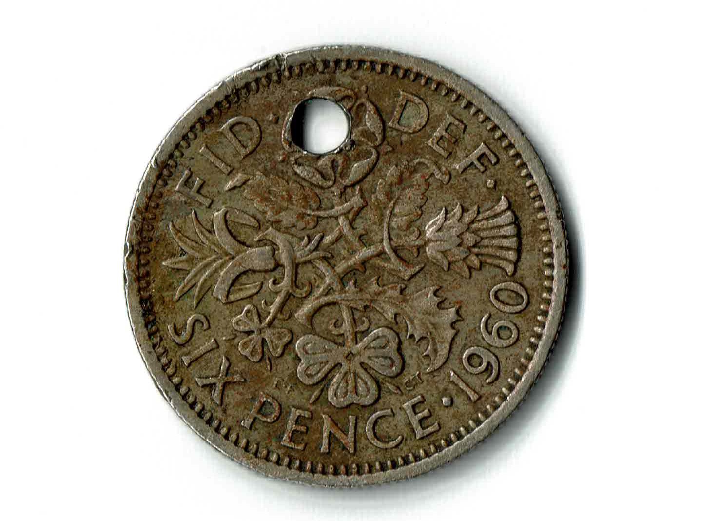 1960 Great Britain 6d Holed Obverse_000001.jpg
