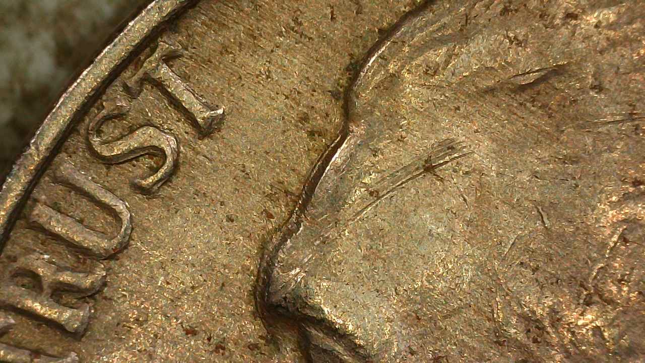 1960 Jefferson Nickel Whats.going.on.1a.Forehead.jpg