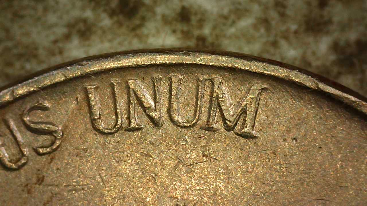 1960 Jefferson Nickel Whats.going.on.2a.UNUM.jpg