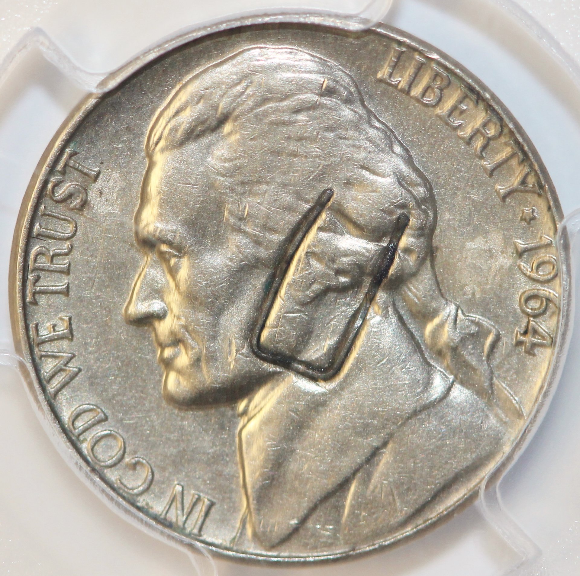 1964 D 5c Stuck Retained Staple OBV.JPG