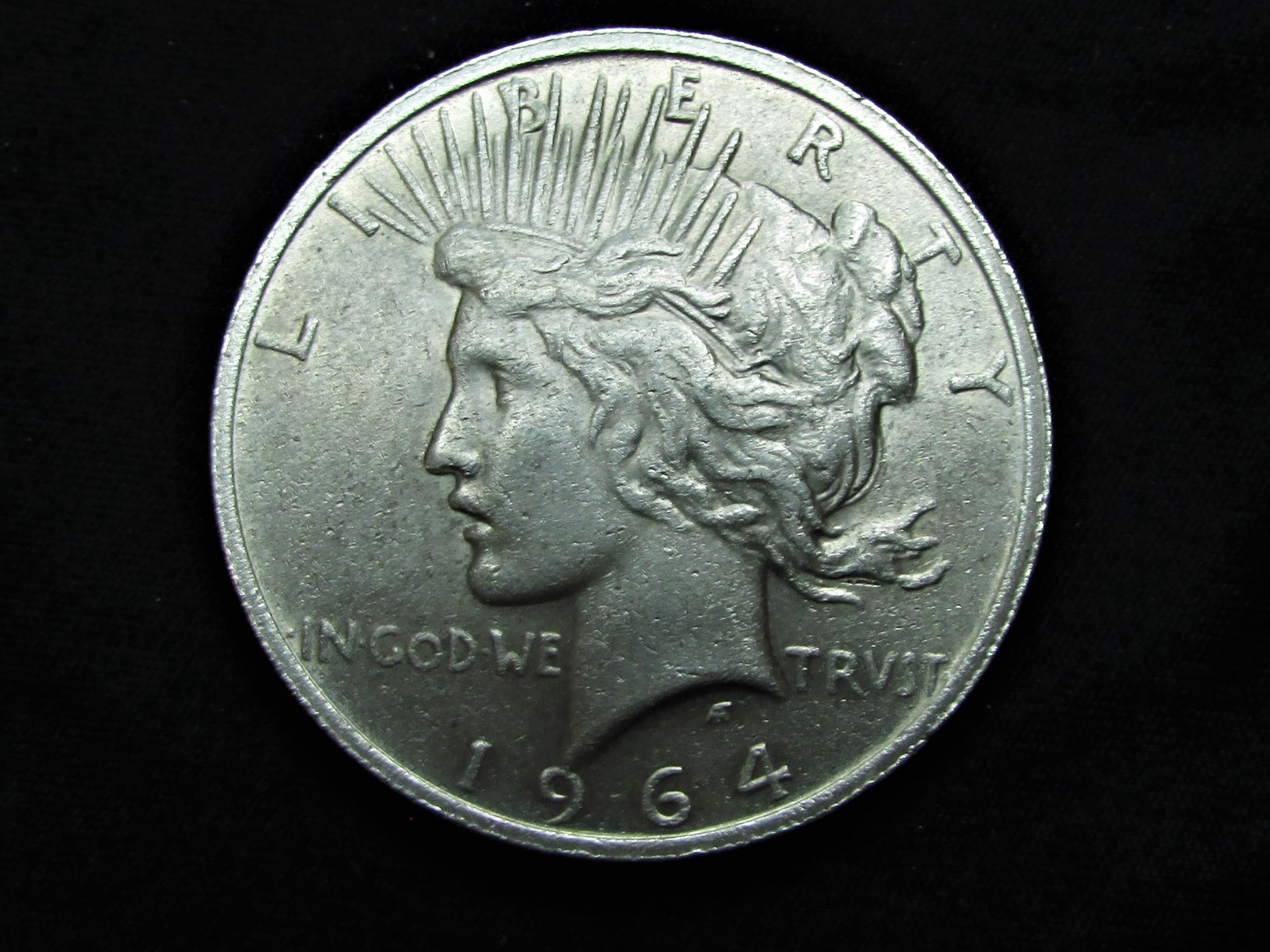 1964-D Peace Dollar (medium relief-circulated) - Die Pair 9 - obverse.JPG