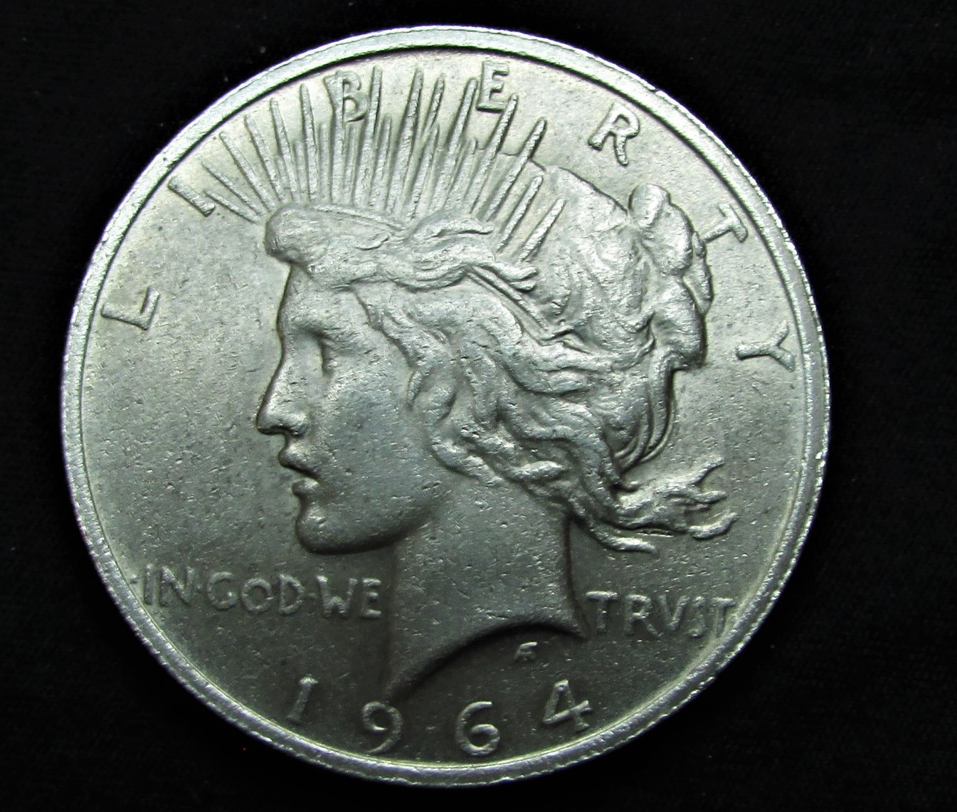 1964-D Peace Dollar (medium relief-circulated) - Die Pair 9 - obverse.JPG