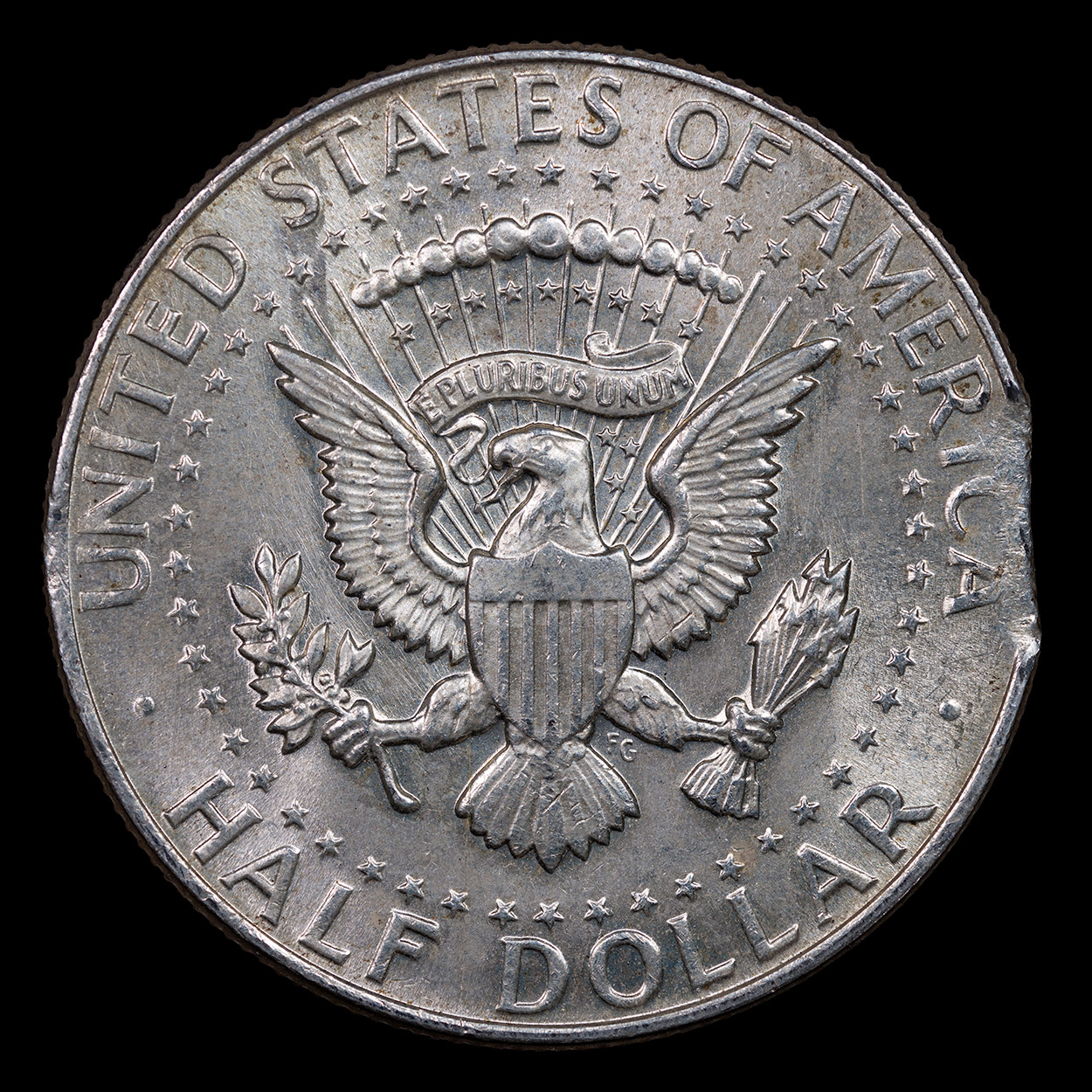 1964-Kennedy-Half-Dollar-Clipped-Planchet-Reverse.jpg