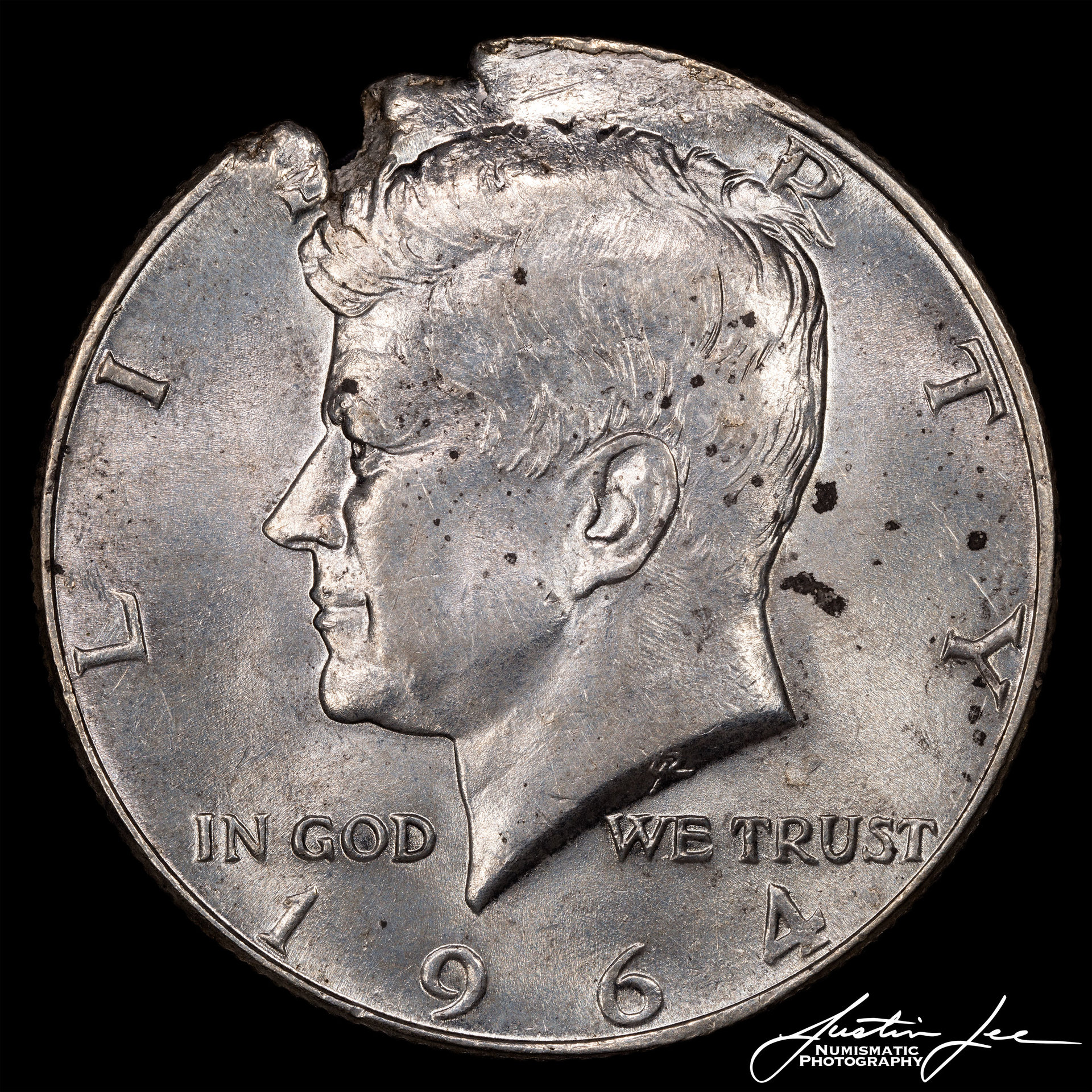 1964-Kennedy-Half-Dollar-Flawed-Planchet-Obverse.jpg