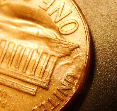 1967 reverse struck through multi-struck metal fragment (3).JPG