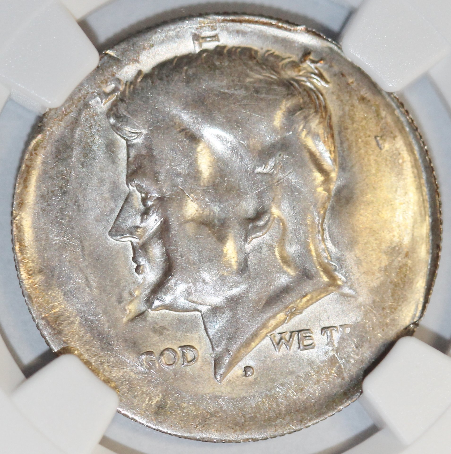 1968-69 D 50c dual struck clad  layer obv.JPG