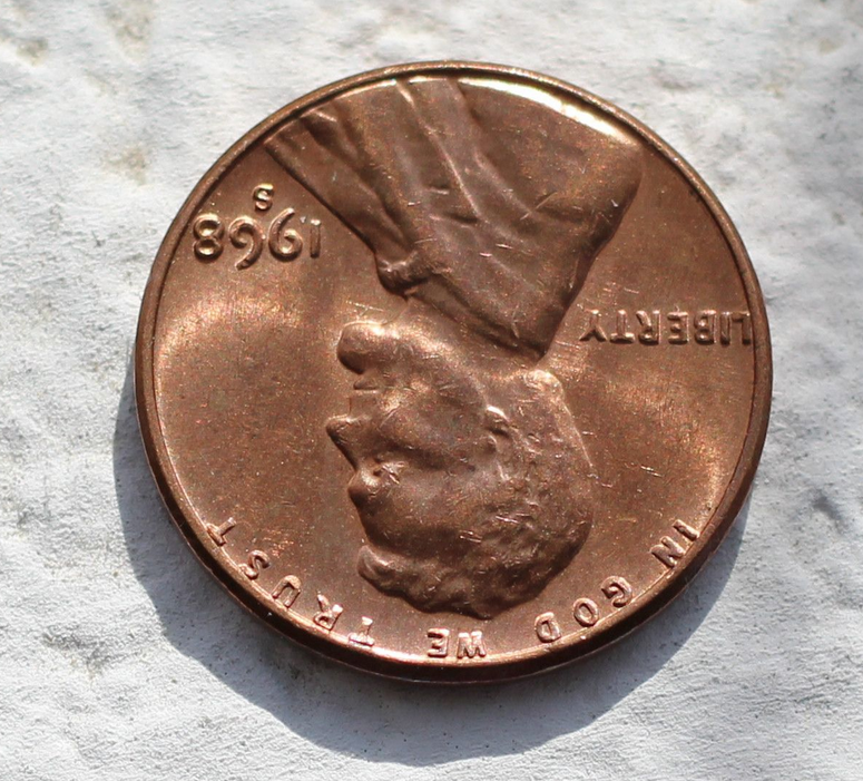 1968 s penny upside down.png