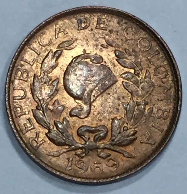 1969 1 centavo colombia repunched date error1.jpg