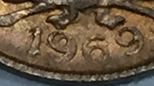 1969 1 centavo colombia repunched date error3.jpg