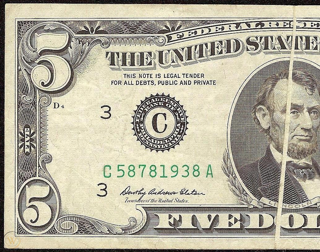 1969-dollar-bill-gutter-fold-error_1_b7a250749ea345c1016241ab5086bfd8.jpg