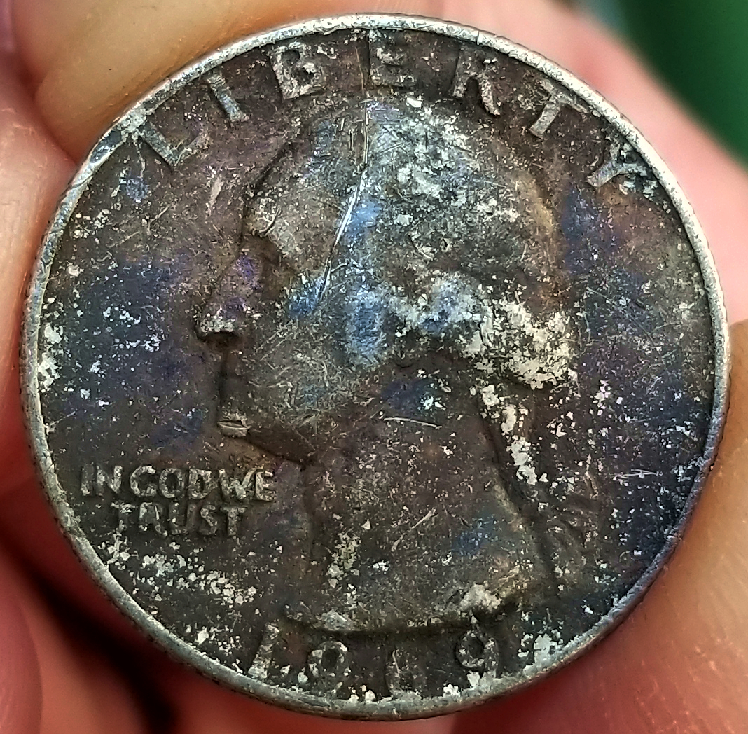 1969 Quarter terminal toner Obverse.jpg