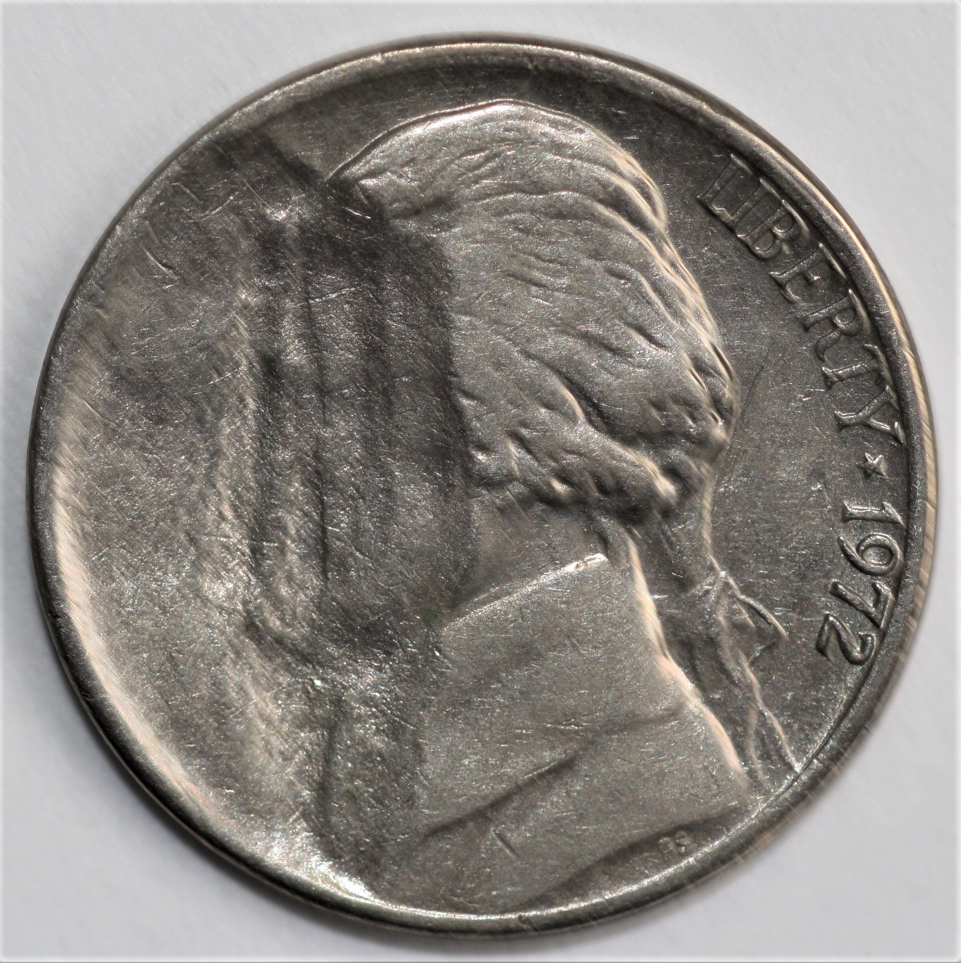 1972 5c strk thru OBV.jpg