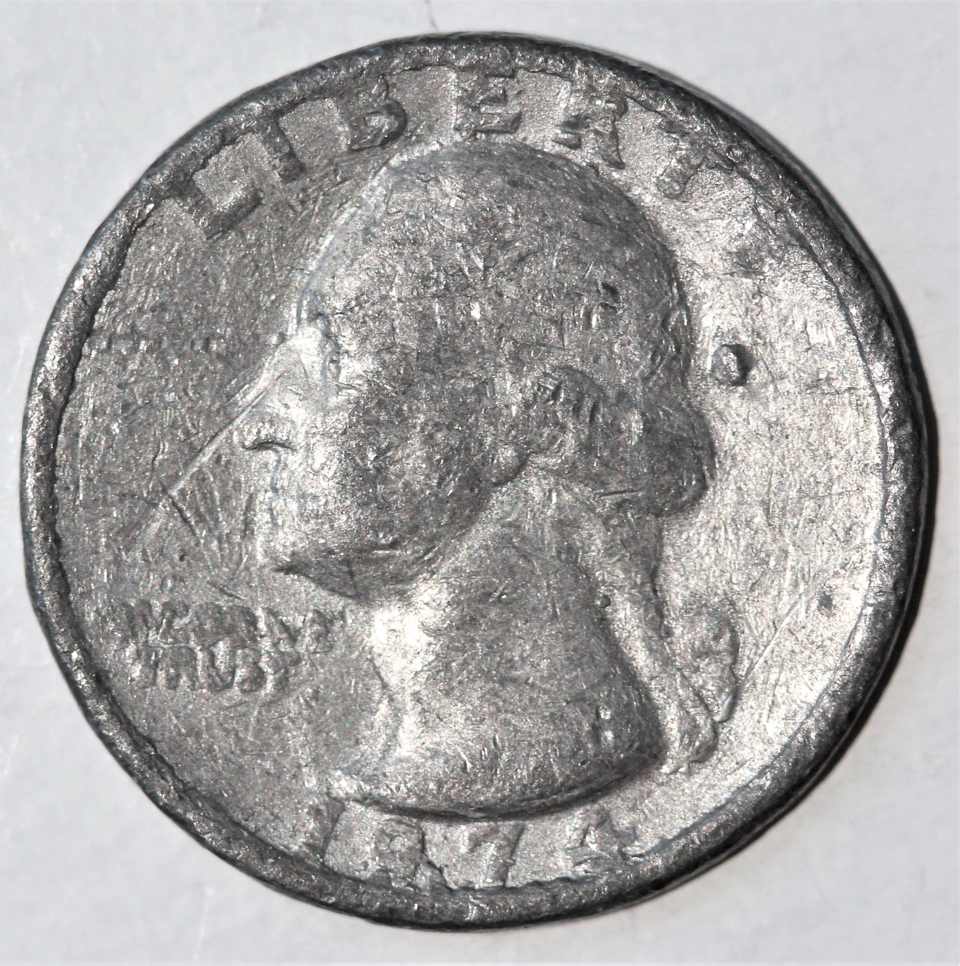 1974 25c fake lead obv.jpg