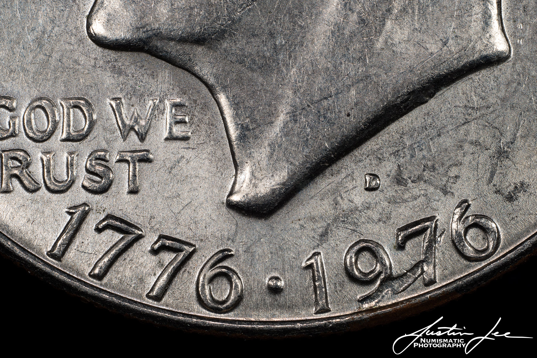 1976-D-Type-1-Eisenhower-Dollar-Strike-Though-Detail.jpg