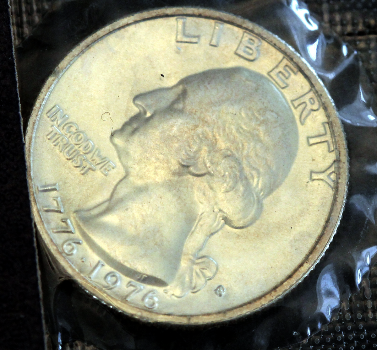 1976_silver_mint_quarter_o_3.png